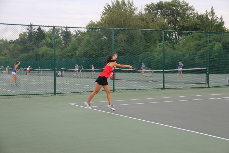 Junior Bree Park implements time management strategies to help her balance school work with her sports commitment on the tennis team.