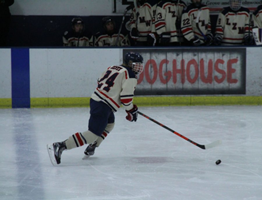 Zentz controls the puck at the blue line during a game against Lake Forest. LZMW won 5-4. 
