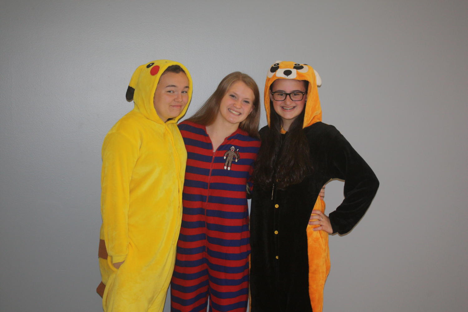 Elizabeth Bocaniciu, Hannah Stanley, and Ashley Carrier, sophomores, dress up in pajamas for day one.