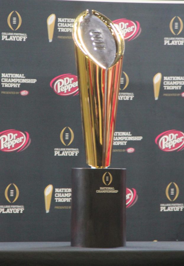 The picture is above is the College Football Playoff National Championship trophy which is presented to the winner of the National Championship game. 