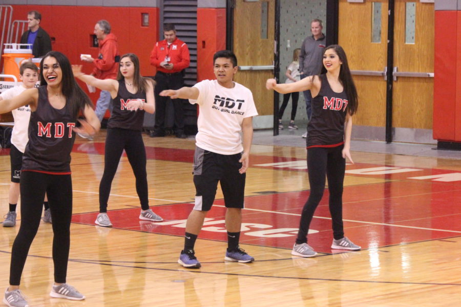 Senior Nick Manligod dances with Sabrina Lee at the Guy-Girl  dance at the Turnabout assembly on Friday, Feb. 23rd. 