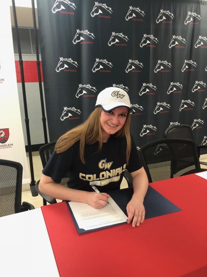 Senior Abigail Lukas signs her letter of intent to play Water Polo at George Washington University in Washington, D.C.