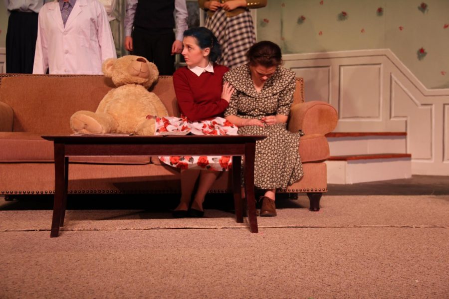 In the winter play “Curious Savage,” Mrs. Savage , played by senior Katie Staroszyck comforts Mrs. Paddy, who was played by senior Paige Steiner.
