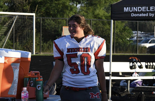 Grace Kaminski, sophomore and junior varsity player, in uniform at a Junior Varsity football game. Kaminski said how being one of the first girls on the football team is “amazing and empowering.” 