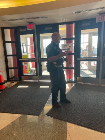 Officer Schult patrolling the front entrance on the morning of Sep. 9.