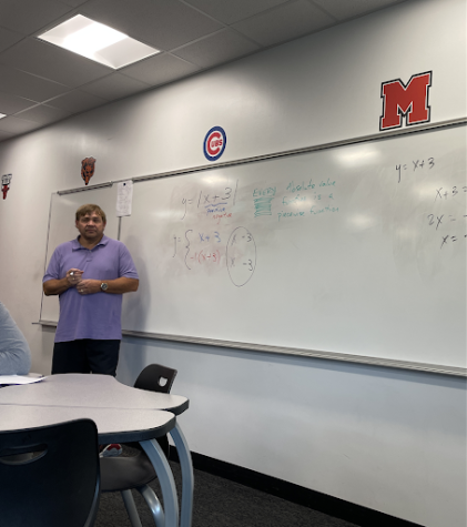 Harding mid-teaching his third period Pre Calculus class.