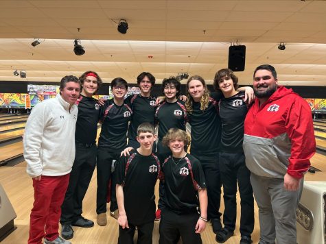 The MHS varsity boys bowling team and their coaches at their sectional on January 21,2023.
