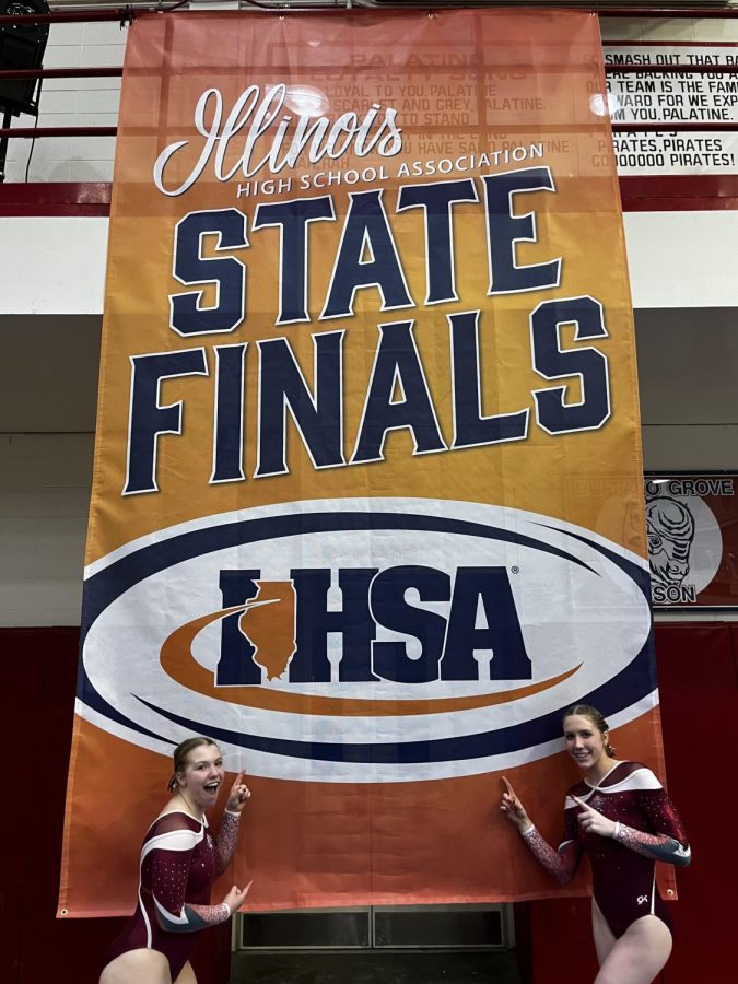 Sophomore Isla Rehm and Freshman Lexie Ede at the IHSA girls gymnastics state finals in Palatine on Feb. 17.“Ending up at event finals and finishing 8th in the state on beam was a great way to end my sophomore season,” Rehm said. “Having the rest of our team come and support us was amazing”