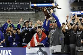 Freddie Freeman holds up the World Series MVP trophy as the Dodgers celebrate the 2024 World Series title. Courtesy of marca.com  